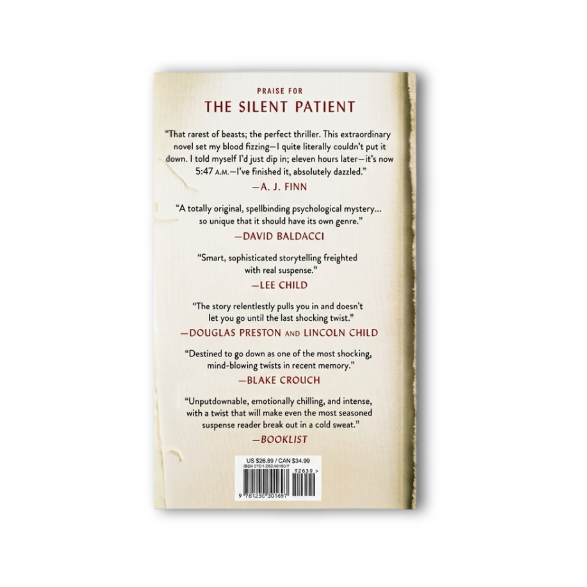 Hardcover book with beige paper cover, The Silent Patient by Alex Michaelides, Celadon Books, back cover praise