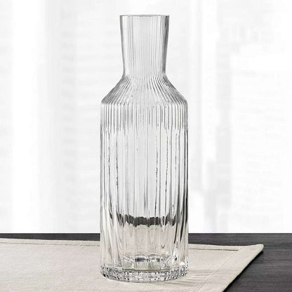 Handmade Hotel Collection fluted glass carafe 45.64 oz displayed on a table, perfect for serving water, wine, or cocktails.