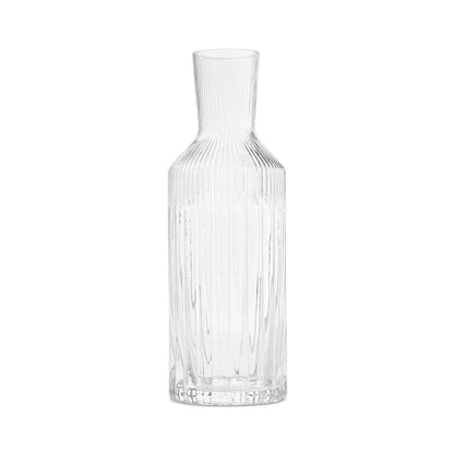 Hotel Collection Fluted Glass Carafe Handmade 45.64 oz with vertical ribbed texture, ideal for elegant beverage serving.