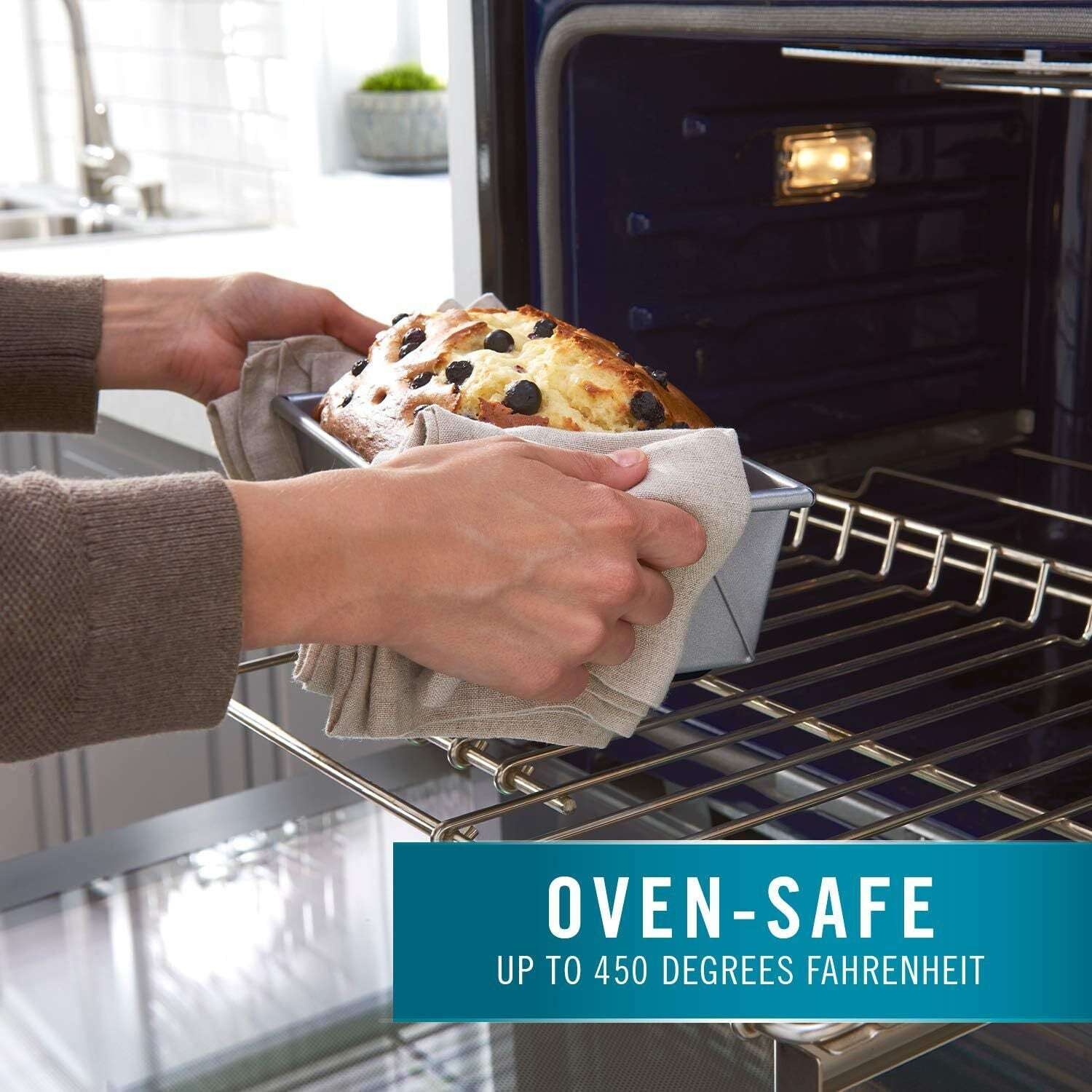 Calphalon 6 Piece Nonstick Bakeware Set Steel Baking Pans loaf pan being placed in oven, oven-safe up to 450 degrees Fahrenheit for versatile baking.