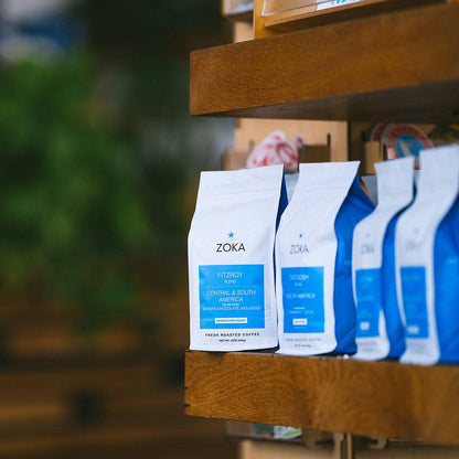 Fitzroy coffee beans in white and blue packaging on store shelf, Central & South America blend