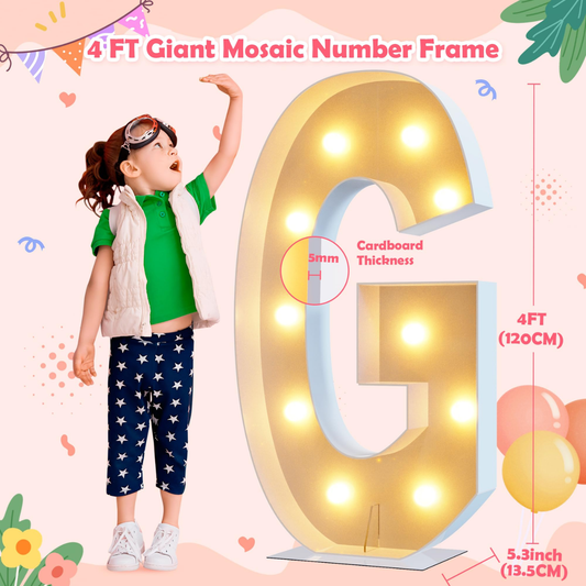 Child next to a large illuminated letter 'G' with decorative elements on a pink background