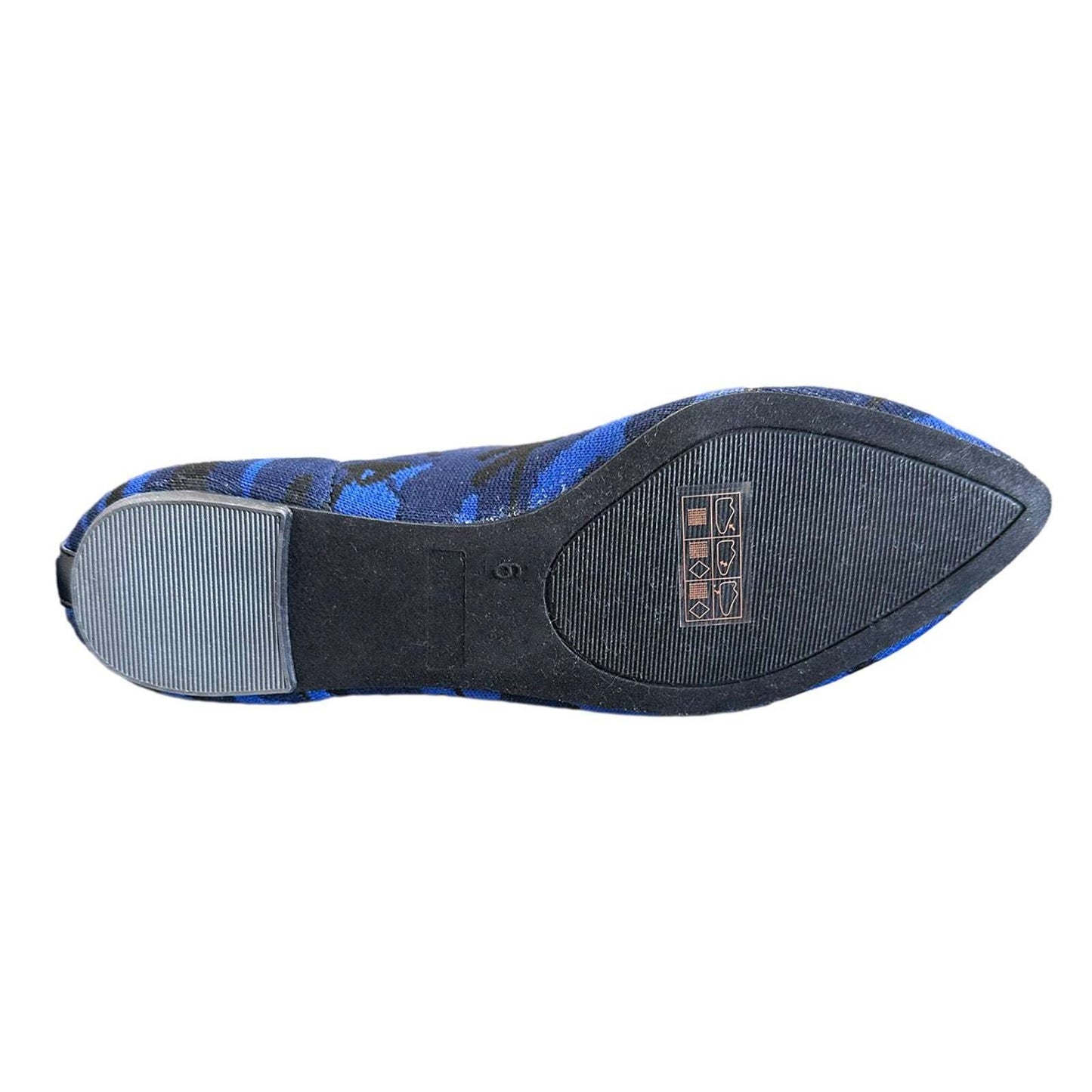 Bottom view of Journee Collection Karise flats in blue black camo, showing textured rubber sole and size marking for women’s size 6.