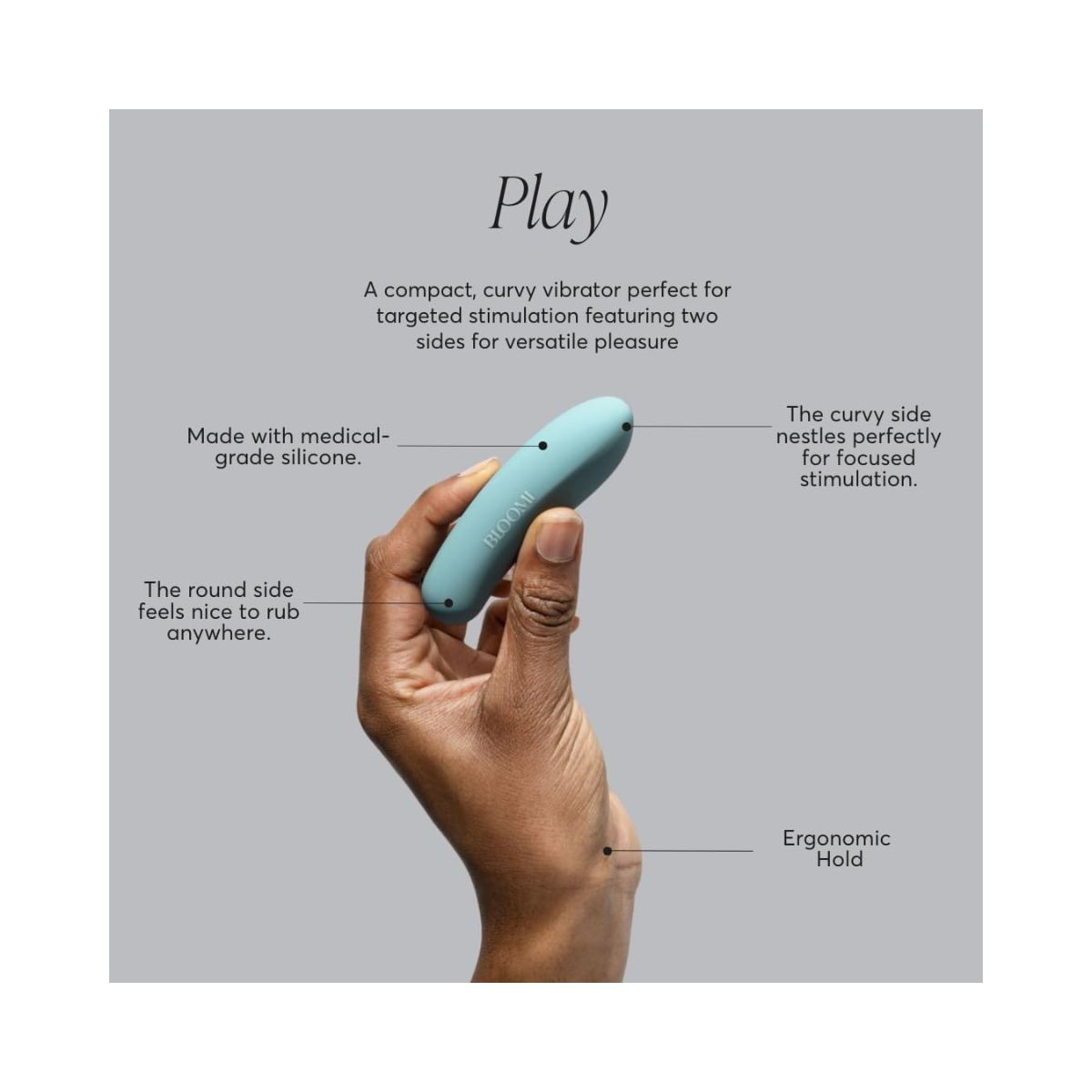 Bloomi Play Waterproof Rechargeable Mini Vibrator held in hand with labeled features including medical-grade silicone, ergonomic hold, and dual-sided design.
