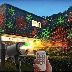 Outdoor Garden Light Projector Remote Timer Waterproof 3m Cable projecting red and green holiday patterns on a modern house exterior.