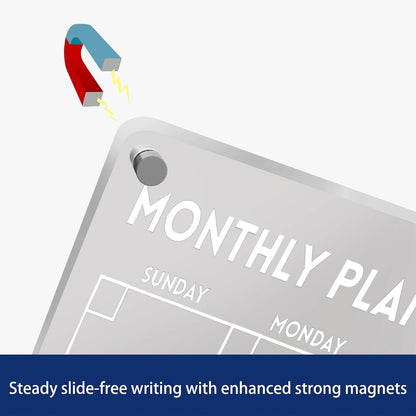 Close-up of Volcanics Acrylic Magnetic Planner showing strong magnet for secure fridge attachment and stable writing surface.