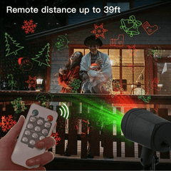 Holiday Projector with remote control illuminating festive red and green patterns on a wooden house, ideal for outdoor Christmas lighting.