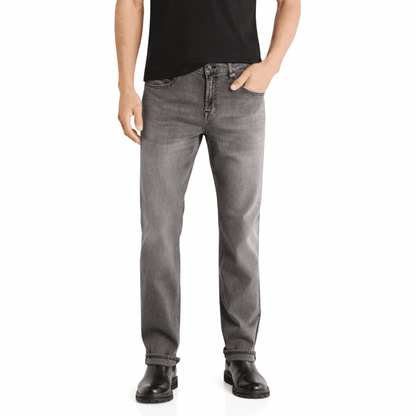 Men's grey jeans with black boots, front view