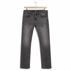 Pair of men's grey jeans on hanger, front view
