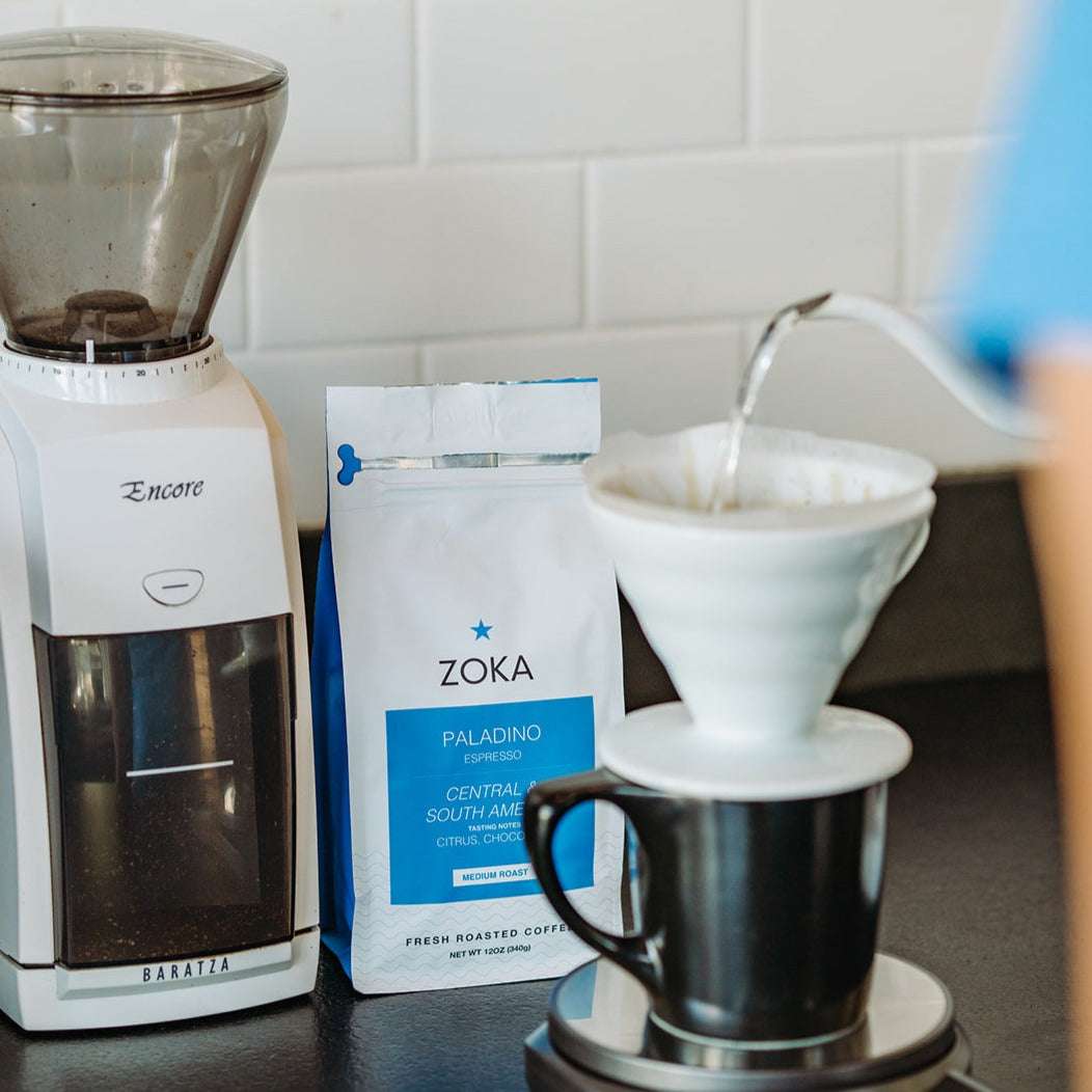 Coffee brewing setup with Zoka Paladino coffee bag, coffee grinder, and brewing equipment for food and beverages category