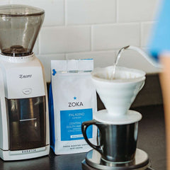 Coffee brewing setup with Zoka Paladino coffee bag, coffee grinder, and brewing equipment for food and beverages category