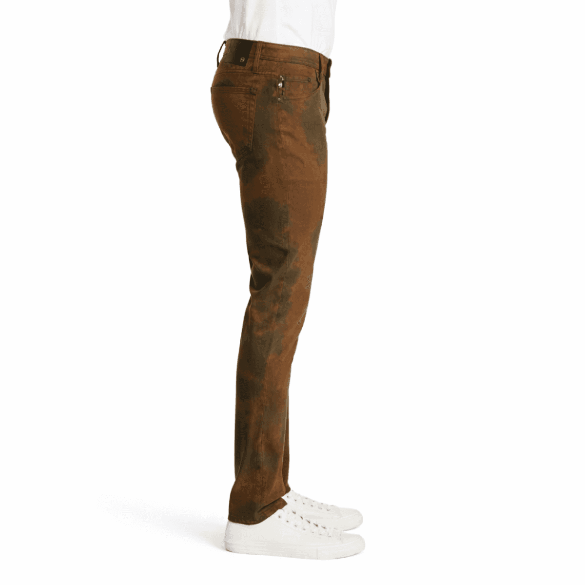Brown AG jeans worn by a model on a white background