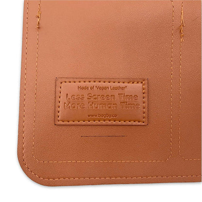 Brown vegan leather product with a label on a white background