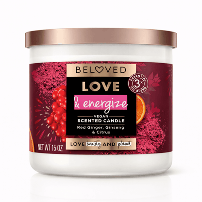 Vegan scented candle with red ginger, citrus, and ginseng in a jar with rose gold lid
