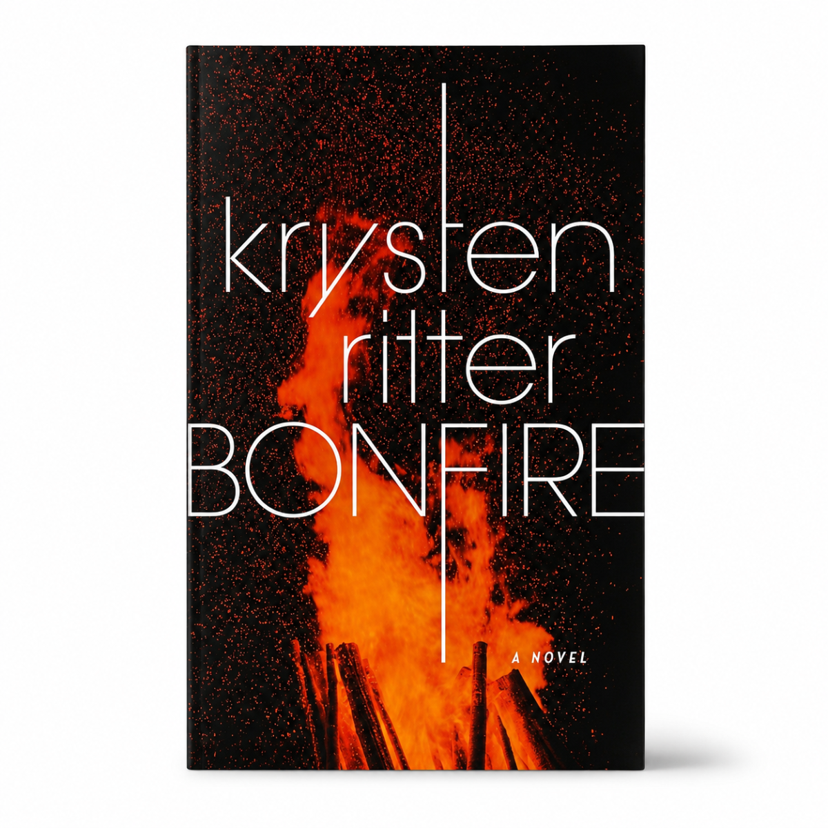 Thriller book with black and orange flame cover, Crown Archetype Bonfire Book by Krysten Ritter, hardcover thriller A Novel