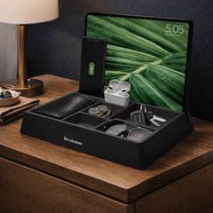 Black Brookstone organizer on a wooden surface with electronic devices and accessories.