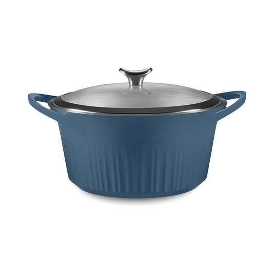 Blue enameled cast aluminum Dutch oven from CorningWare with lid on a white background