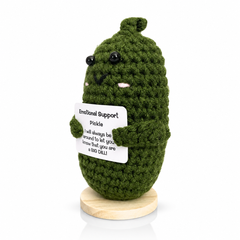 Green plush emotional support pickle figurine by Deal Seeker Collection, 4.5 in, with Emotional Support Pickle sign front