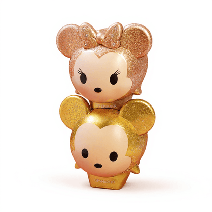 Lip Smacker Disney Mickey Minnie lip balm duo with glittery gold packaging and collectible toppers