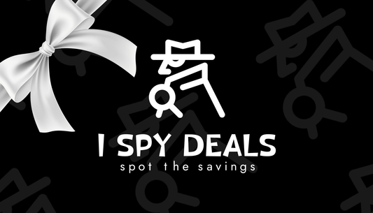 I Spy Deals Gift Card design featuring a white bow and magnifying glass logo on a black background. Ideal for off-price home and lifestyle shopping.