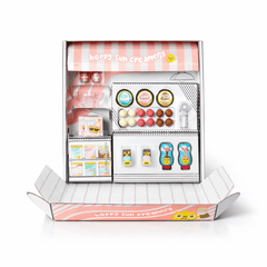 Open box view of MGA'S Mini Verse Ice Cream Social playset on a white background
