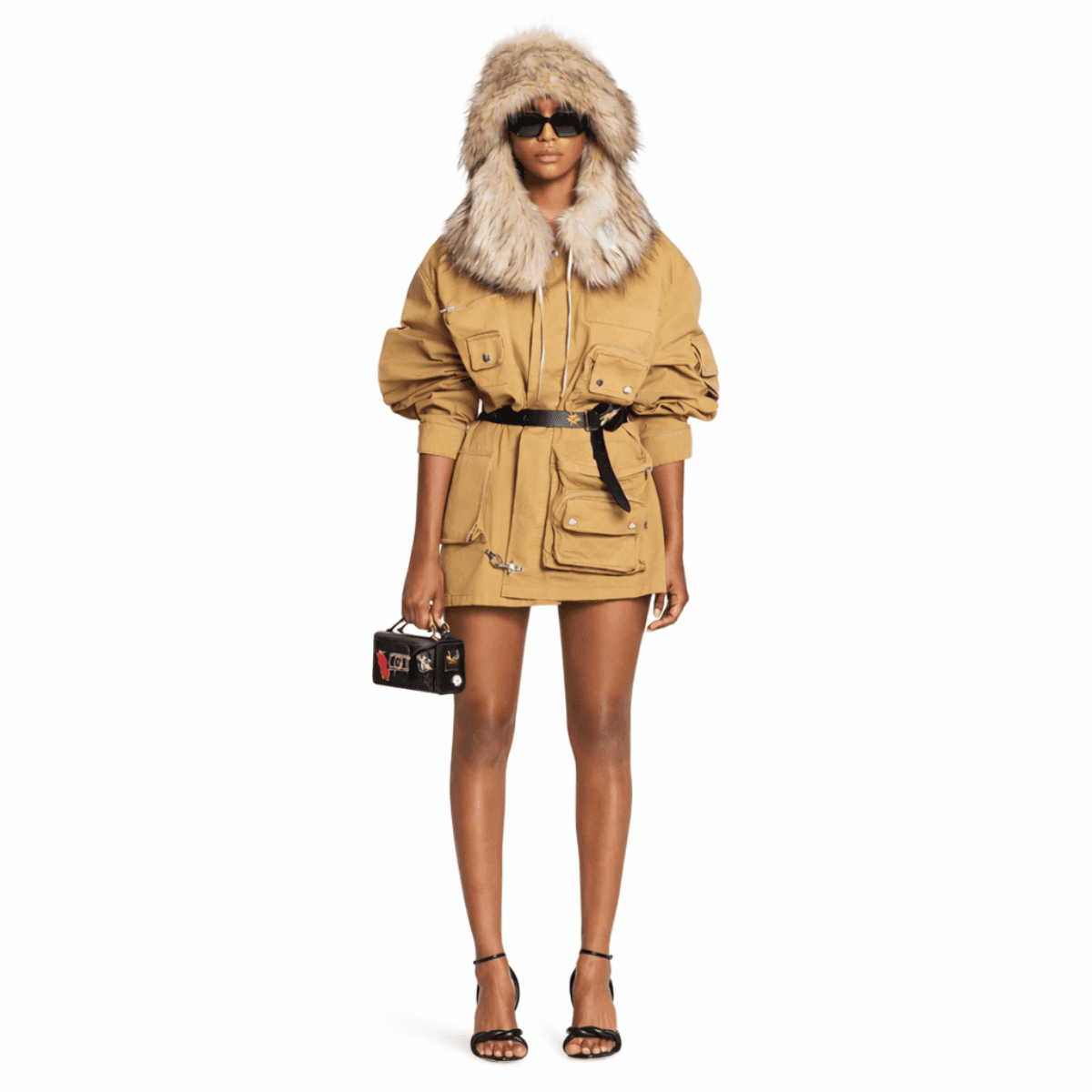 Model in Lanvin x Future jacket with fur-lined hood and cargo pockets