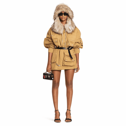 Model in Lanvin x Future jacket with fur-lined hood and cargo pockets