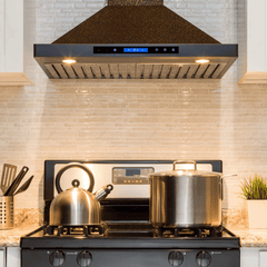 Stove with pots and a kettle in a kitchen setting