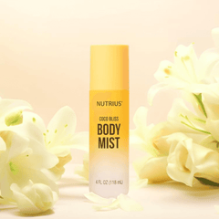 Nutrius Coconut Body Mist Spray 4 oz with white flowers background