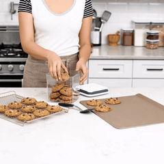 Cookies stored in a clear airtight container with a lid