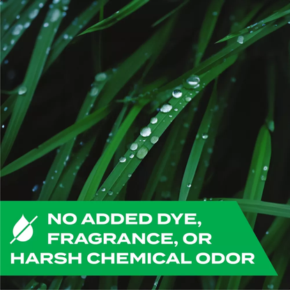 Green grass with water droplets and a green label stating 'No added dye, fragrance, or harsh chemical odor'.