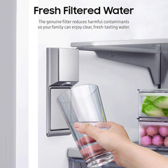 A hand holding a clear glass under a stainless steel water filter dispenser inside a refrigerator, with text at the top reading 'Fresh Filtered Water.'.