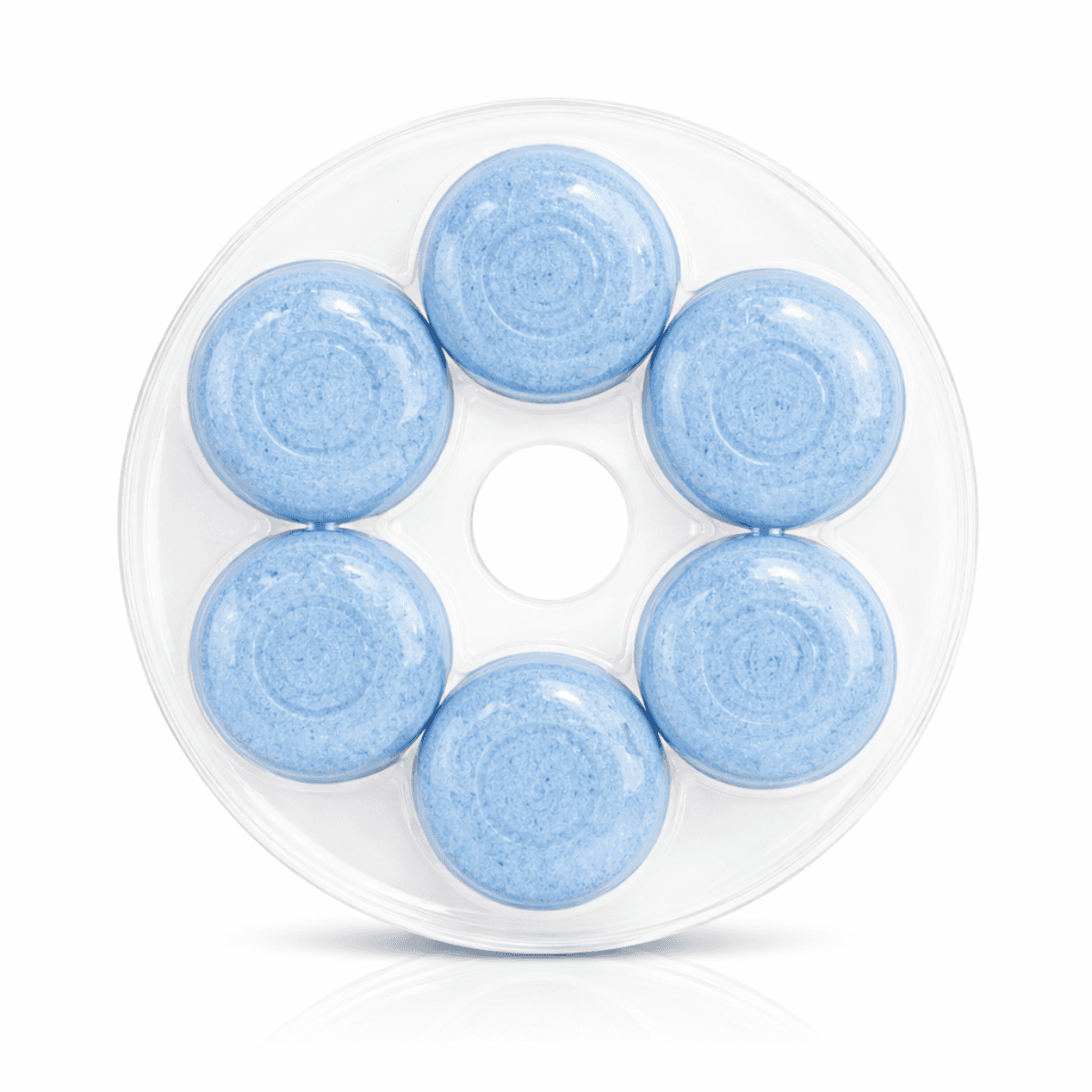 Close-up of blue dissolving toilet bowl cleaner tablets in container