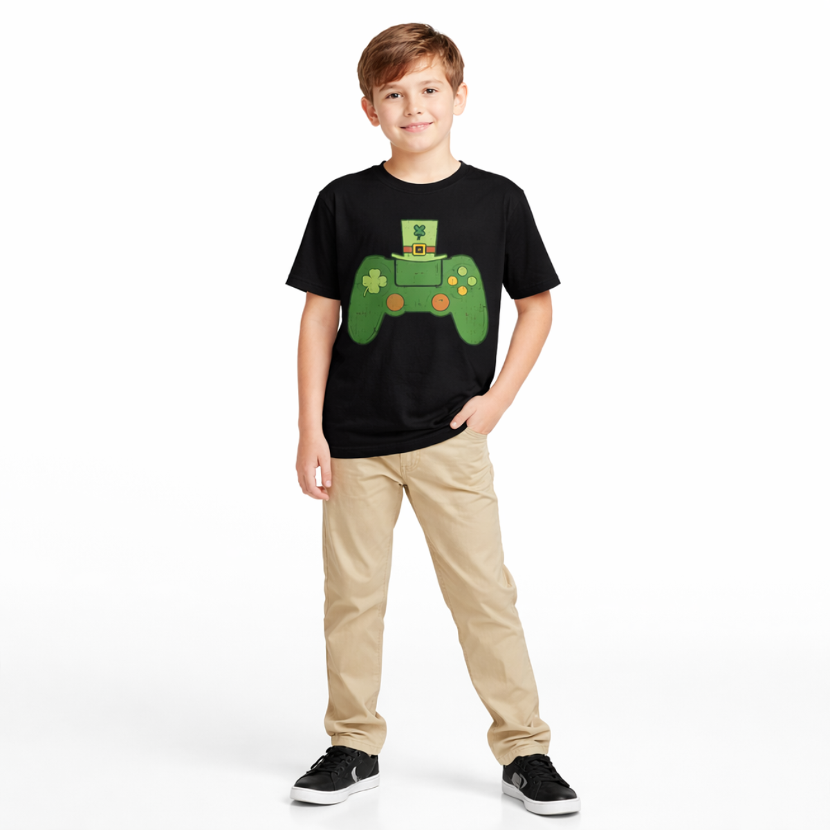Child wearing a St. Patricks Day black t-shirt with a green game controller design on a white background
