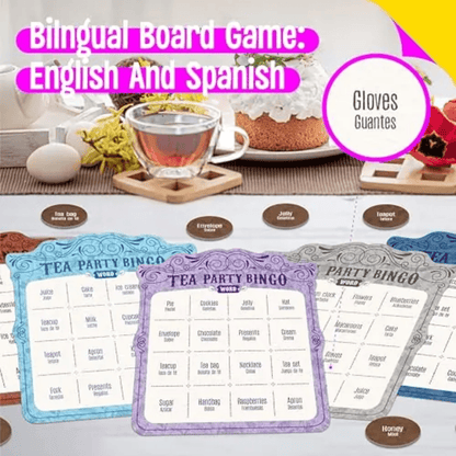 Tea party bingo cards with English and Spanish text, placed on a table with tea and cake.