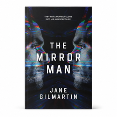 Hardcover book MIRA The Mirror Man by Jane Gilmartin, black cover with colorful mirrored face artwork design on front