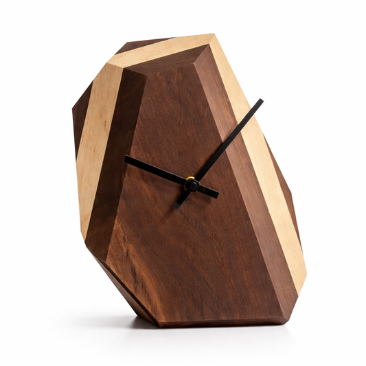 Wooden geometric clock with black hands on a white background