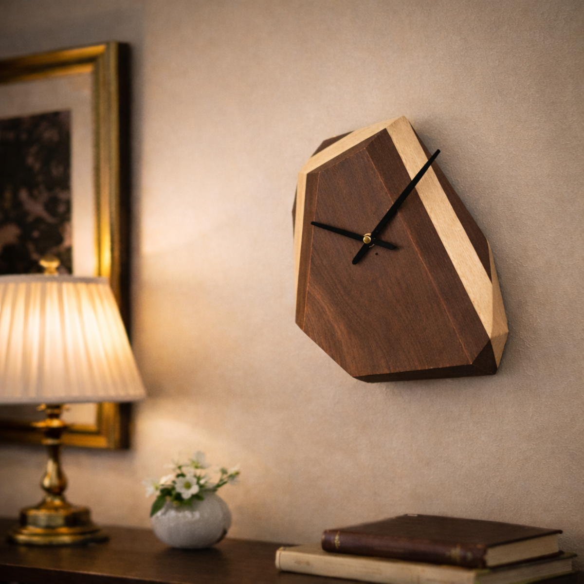 Wooden wall clock on a wall with a lamp and books in the foreground