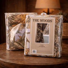 Packaged curtain set with 'The Woods' branding on a wooden surface.