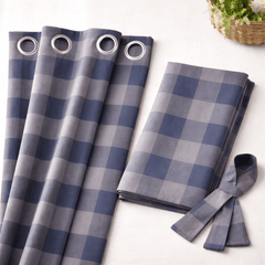 Blue and gray checkered curtains with grommets on a white background