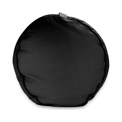 Black meditation cushion in carrying bag